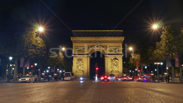 Arc de Triomphe Paris beleuchtet Nacht Ansicht Verkehr Stock foto © d13