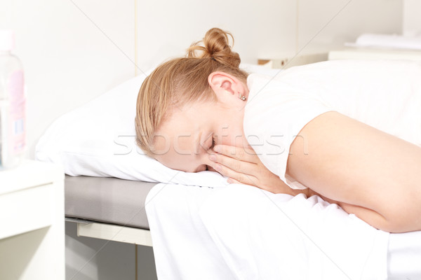 Girl is scared of an injection. Stock photo © d13