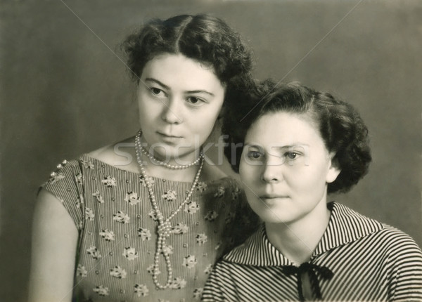 Vintage portrait of two attractive women Stock photo © d13