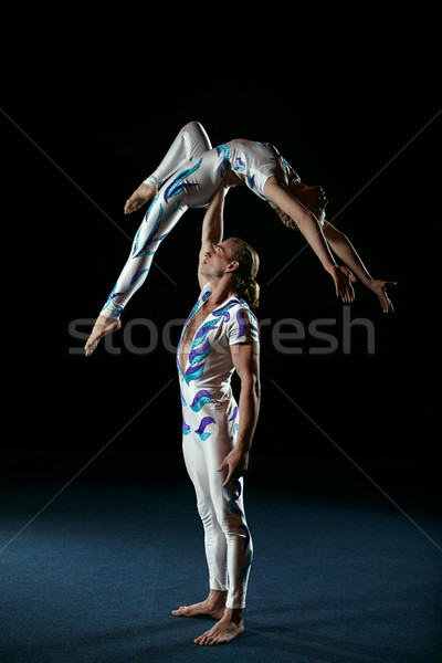 Circus artists perform different tricks. Stock photo © d13