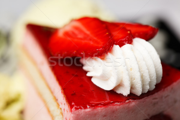 Whirl of whipped cream topping on a cake Stock photo © d13