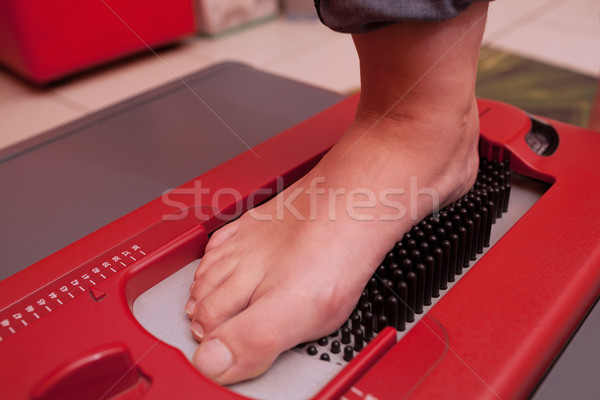 Foot during scanning on device Stock photo © d13
