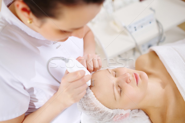 Ultrasonic face cleaning at the beauty spa Stock photo © d13