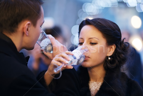Couple toasting each other with champagne Stock photo © d13