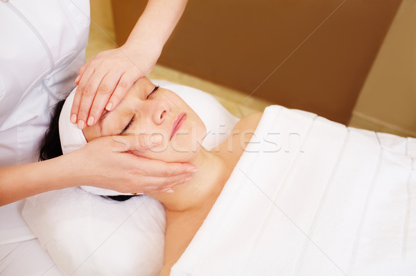 Facial treatment with professional massage of cosmetician Stock photo © d13