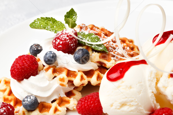 Waffle with vanilla ice cream and fresh berries Stock photo © d13