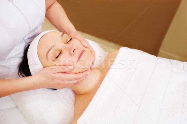 Woman taking facial treatments at beauty spa Stock photo © d13