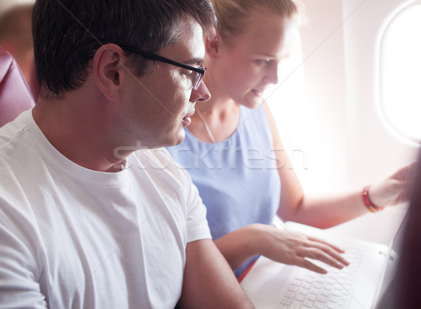 Stock photo: People with Laptop on a Plane