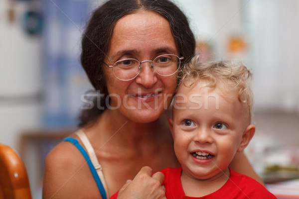 Forty years old mother with her son Stock photo © d13