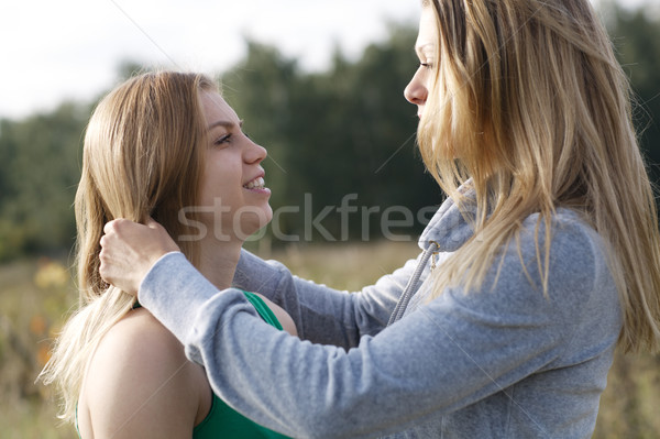 Two sisters or female friends in a close embrace Stock photo © d13