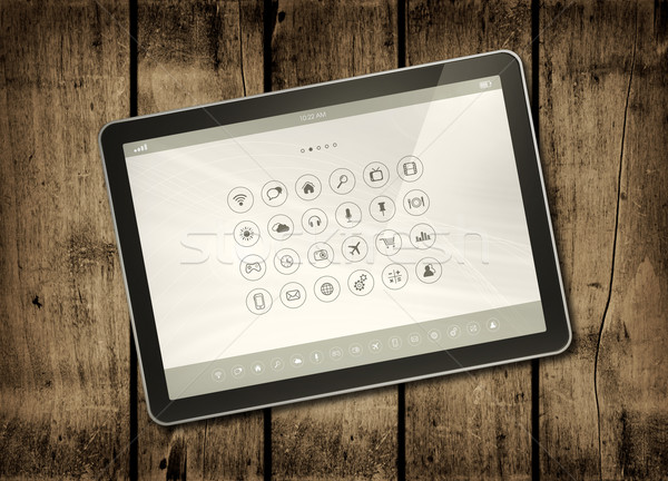 Digital tablet PC on a dark wood table Stock photo © daboost