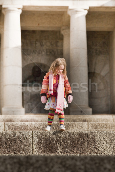 Funky little girl on big steps Stock photo © danienel