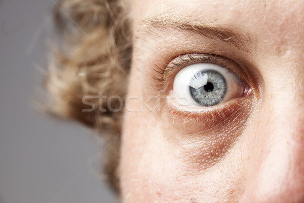 Ojo amplio cerrado primer plano hombre rubio Foto stock © danienel
