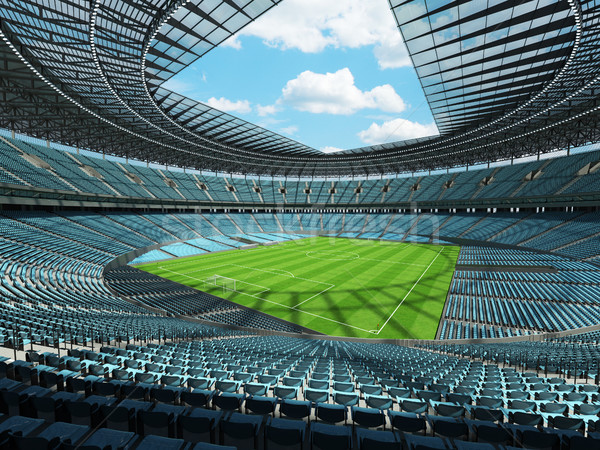 Round soccer - football stadium with sky blue seats and VIP boxes for hundred thousand people Stock photo © danilo_vuletic