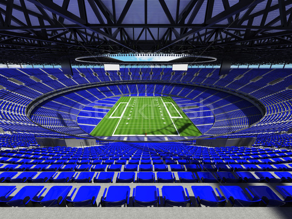 Round american football stadium with blue seats for hundred thousand fans with VIP boxes Stock photo © danilo_vuletic