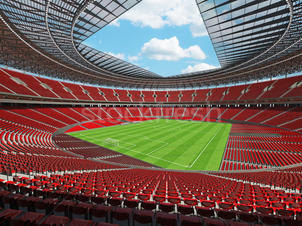 3D render of a round football -  soccer stadium with red seats Stock photo © danilo_vuletic