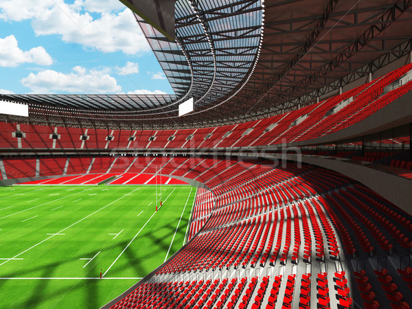 3D render of a round rugby stadium with  red seats and VIP boxes Stock photo © danilo_vuletic