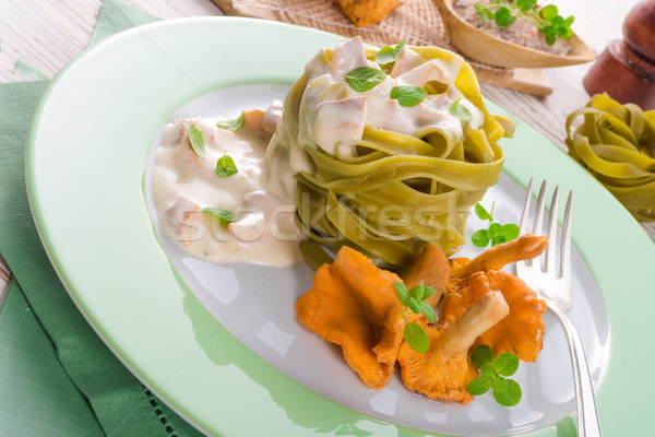 ,,tagliatelle con Spinaci,, with chanterelles Stock photo © Dar1930