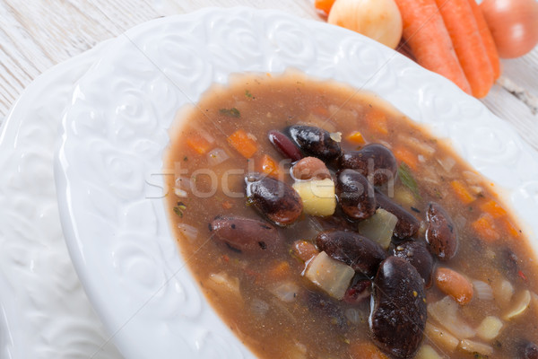 Sharp minestra di fagioli alimentare rosso pranzo cucchiaio Foto d'archivio © Dar1930