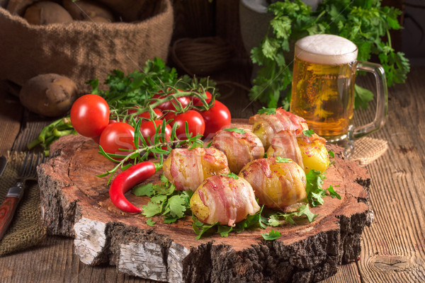 Baked potatoes wrapped in ham Stock photo © Dar1930