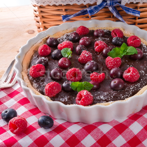 Stock photo: chocolate tartelette with forest fruits 