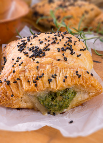 Stock photo: puff pastry with spinach filling and black cumin