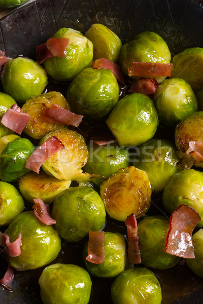Stock photo: Honey caramelized brussels sprouts with ham