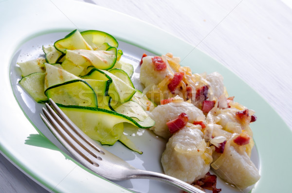 Stock photo: Silesian dumplings with Bacon and zucchini