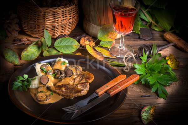 Steak with potato dumplings and forest mushroom sauce Stock photo © Dar1930
