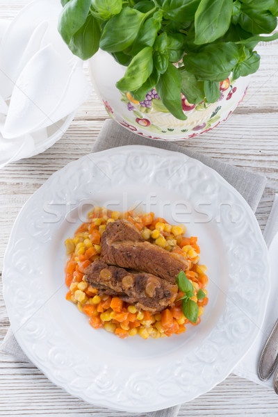 Stock photo: ribs with carrots and maize
