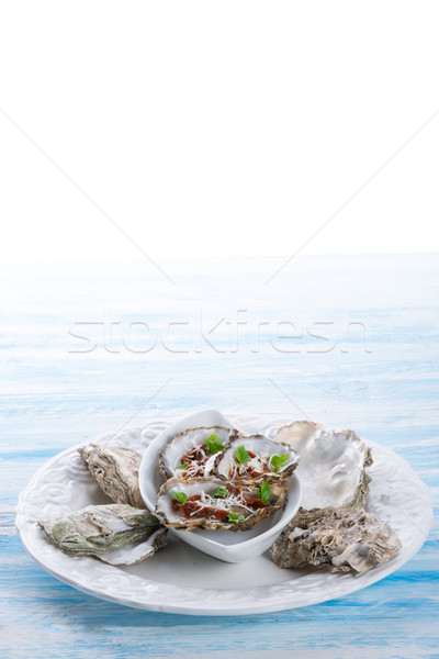 oysters with parmesan and baked tomatoes Stock photo © Dar1930