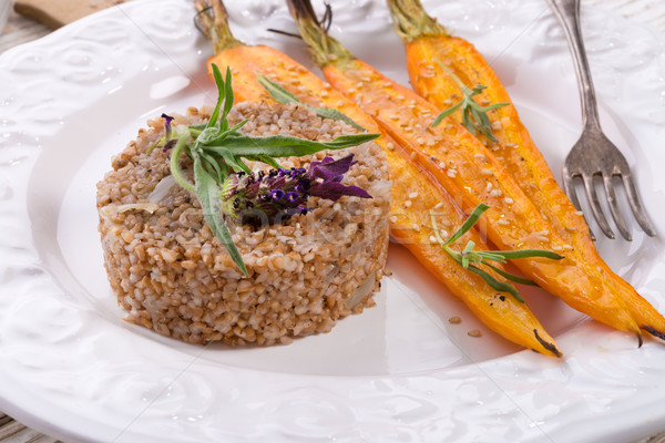 Wheat groats  and Caramelized carrots  Stock photo © Dar1930