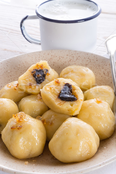 Stock photo: Potato dumplings with plums full