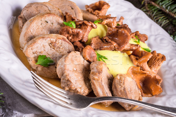Mashed potatoes with pork medallions and chanterelle sauce Stock photo © Dar1930