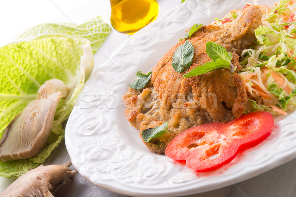 baked oyster mushrooms with fresh savoy cabbage salad Stock photo © Dar1930