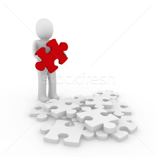 Stock photo: 3d human red puzzle