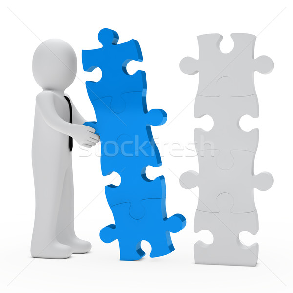 Biznesmen puzzle budowy niebieski biały ściany Zdjęcia stock © dariusl