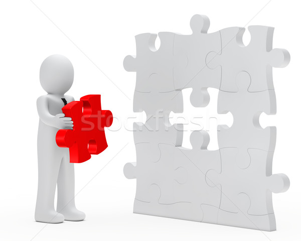 Imprenditore tenere puzzle rosso successivo bianco Foto d'archivio © dariusl