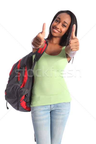 Thumbs up double success for African teenage girl Stock photo © darrinhenry