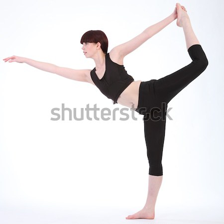 Yoga King Dancer Pose by beautiful fitness woman Stock photo © darrinhenry