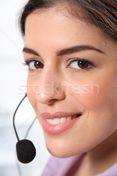 Customer service by beautiful young woman Stock photo © darrinhenry