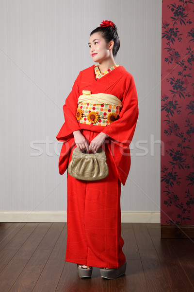 Beautiful oriental woman in red japanese kimono Stock photo © darrinhenry