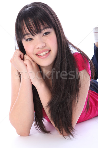 Portrait pretty oriental teenager student girl Stock photo © darrinhenry
