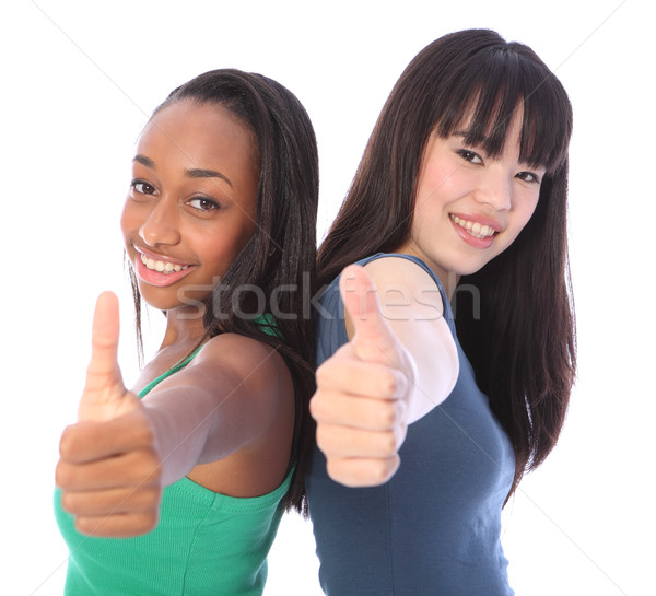 Team success for African and Japanese teenagers Stock photo © darrinhenry