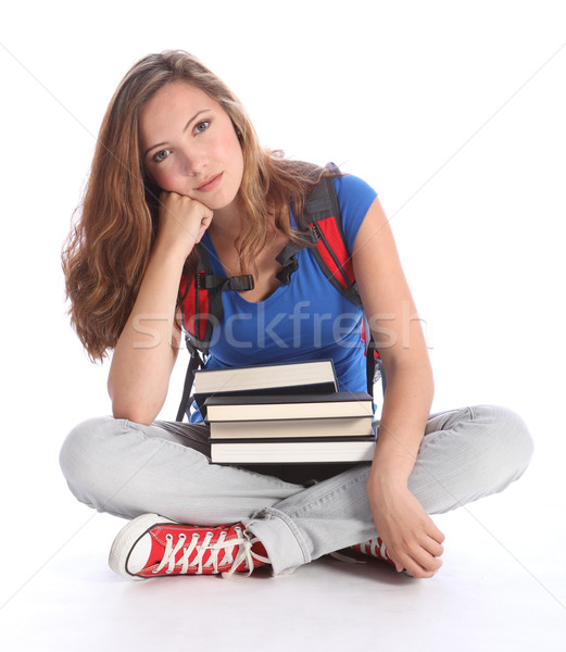 Sad teenage student girl with school study books Stock photo © darrinhenry