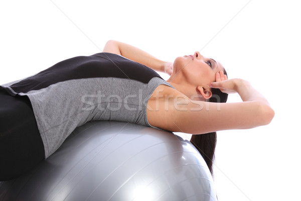 Abdominal crunches by fit woman on exercise ball Stock photo © darrinhenry