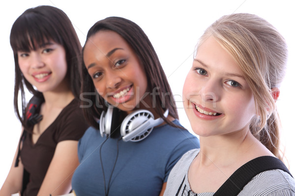 Stock photo: Blonde teenage student girl and ethnic friends