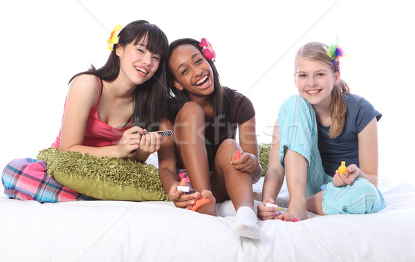 Pyjama party pedicure for ethnic teenage girls Stock photo © darrinhenry
