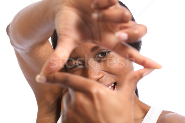 Beautiful woman with fun hand signal expression Stock photo © darrinhenry