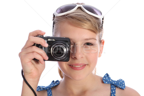 Blonde teenager photographer girl with camera Stock photo © darrinhenry